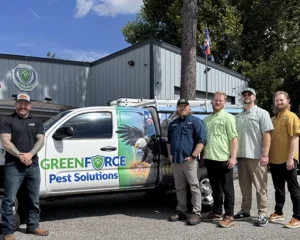 AXN/Greenforce photo in front of Greenforce truck